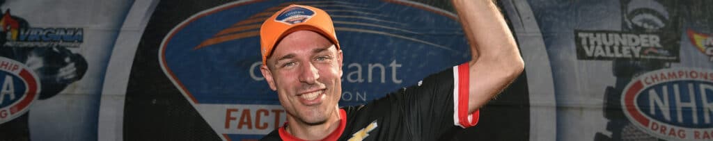 David Barton celebrates winning NHRA